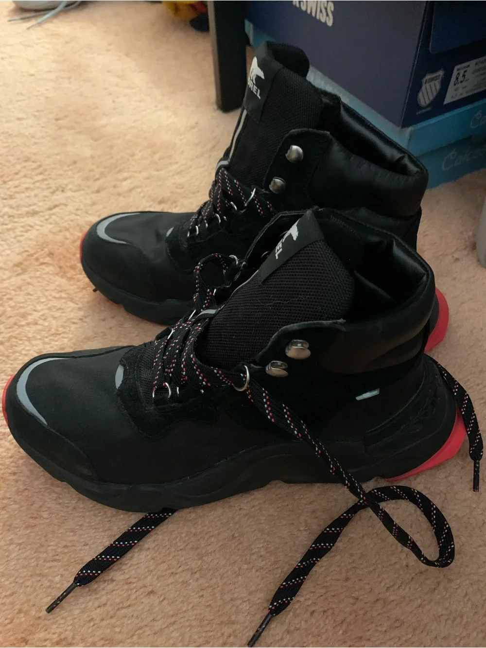 Sorel Black women's Lace-Up Trail Boots with Red Accents